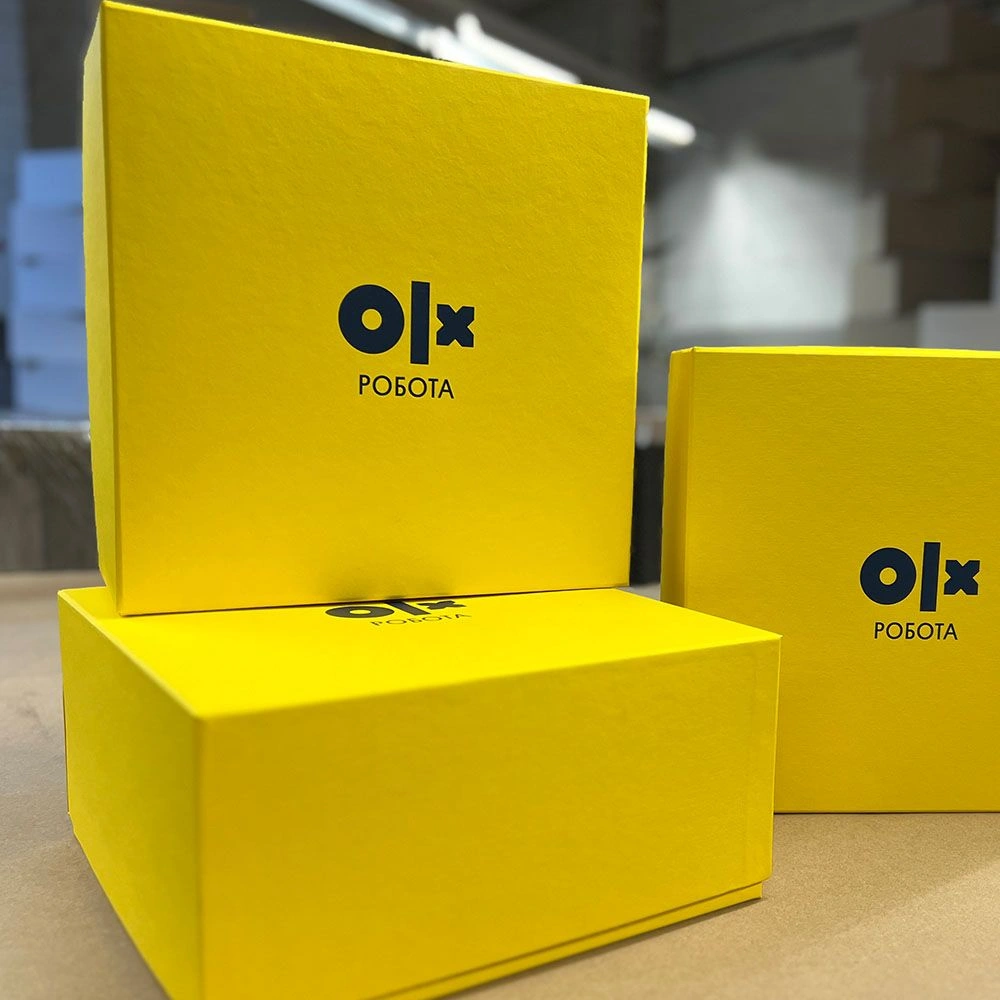 Жовті коробки з логотипом OLX