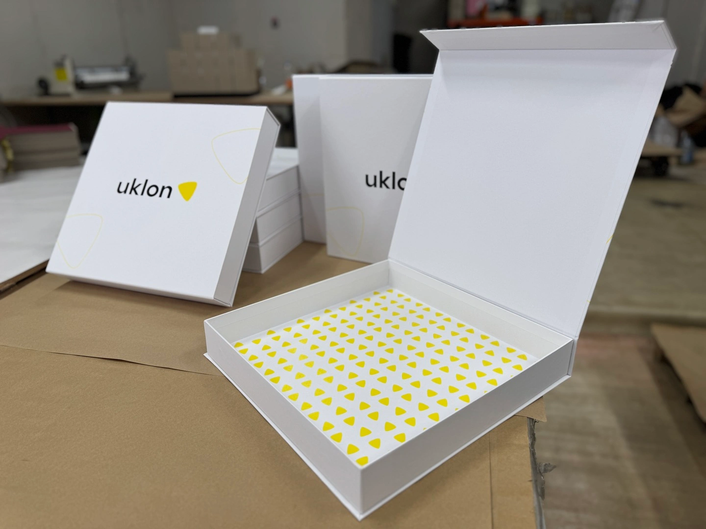 Corporate packaging on magnets with the Uklon logo wholesale